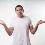 confused parent looking at phone