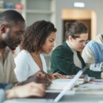 diverse students collaborating in classroom