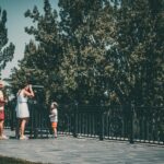 family looking at laptop computer