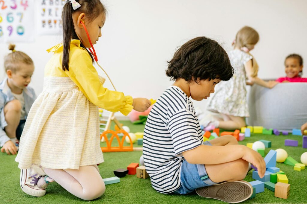 kids playing with modeling compound