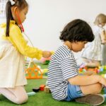 kids playing with modeling compound