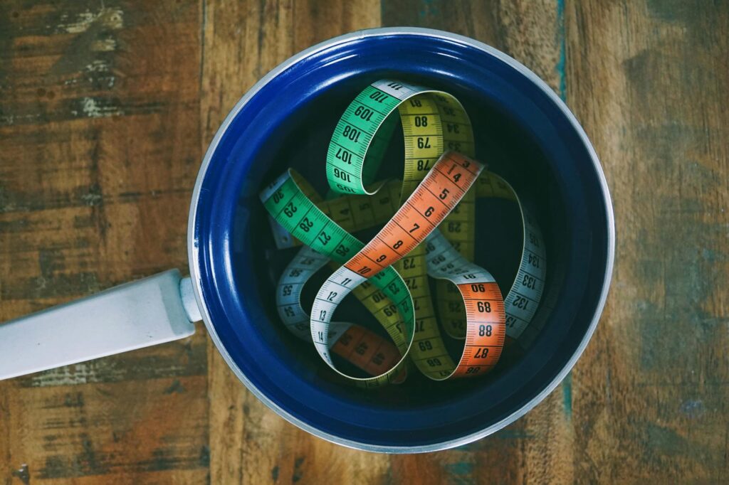 kitchen measuring cups and liter bottle
