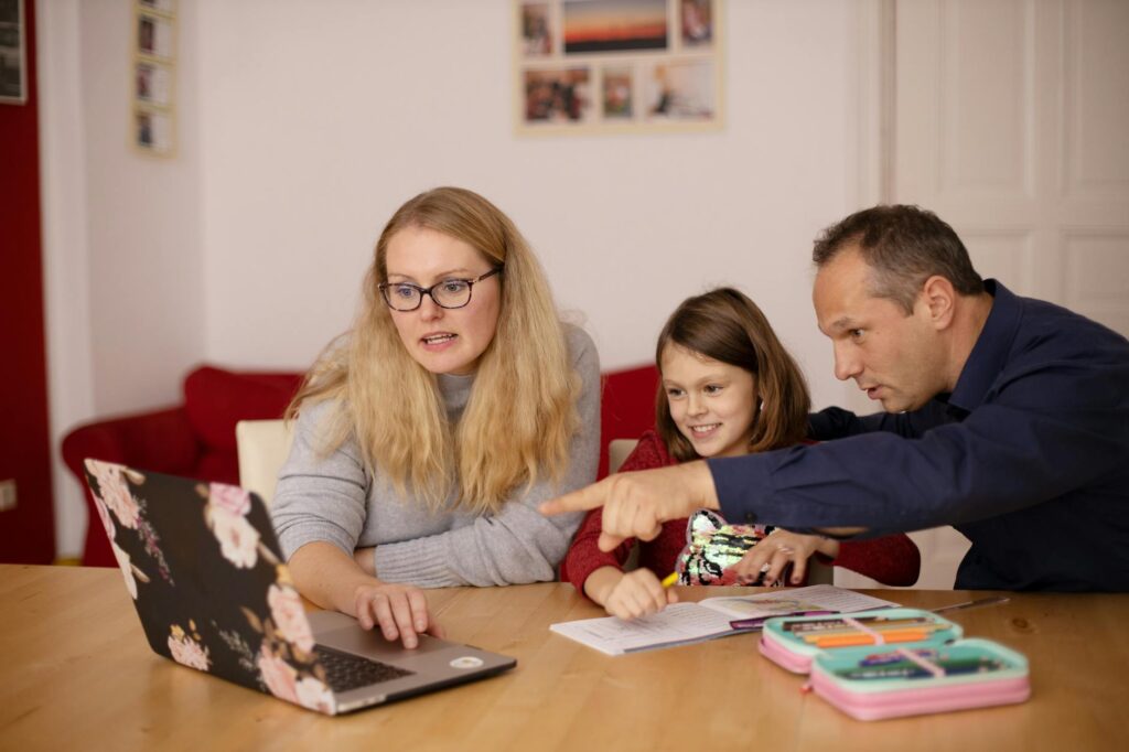 parent helping child with homework