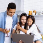 parent looking at computer concerned