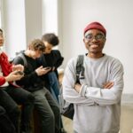 student in grimp suit