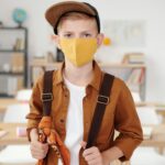 student wearing futuristic tech jumpsuit