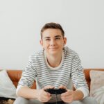 teenager playing basketball smartphone