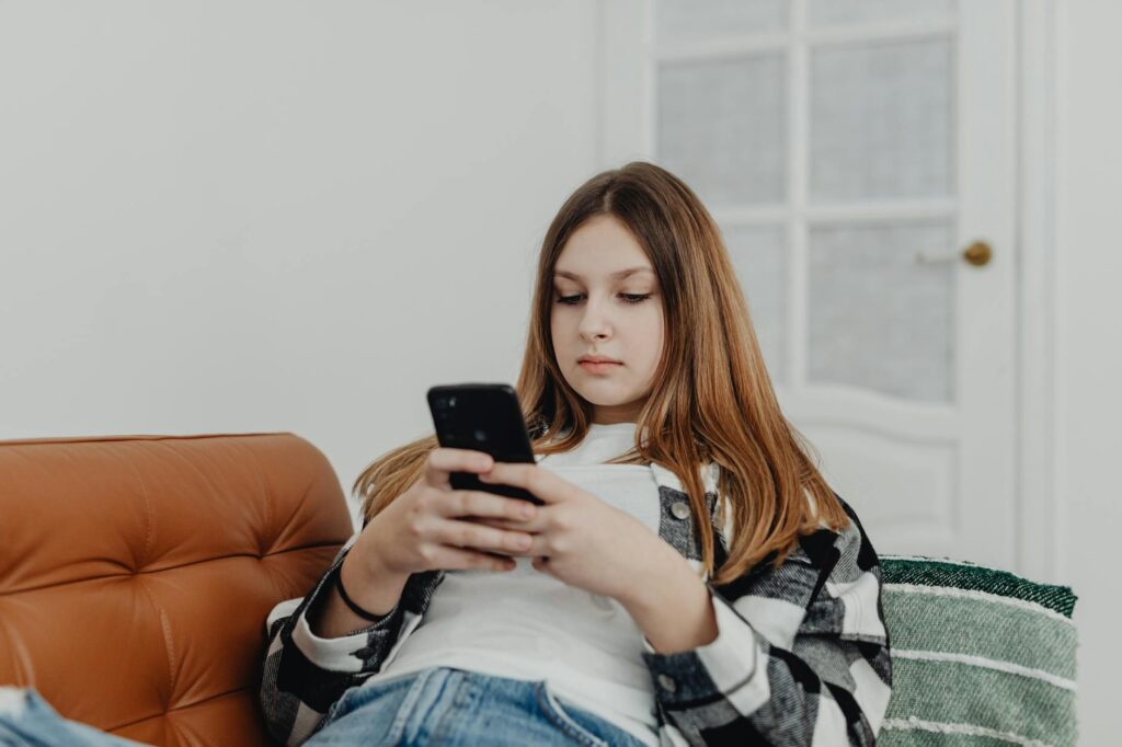 teenager using laptop anonymous cloud storage