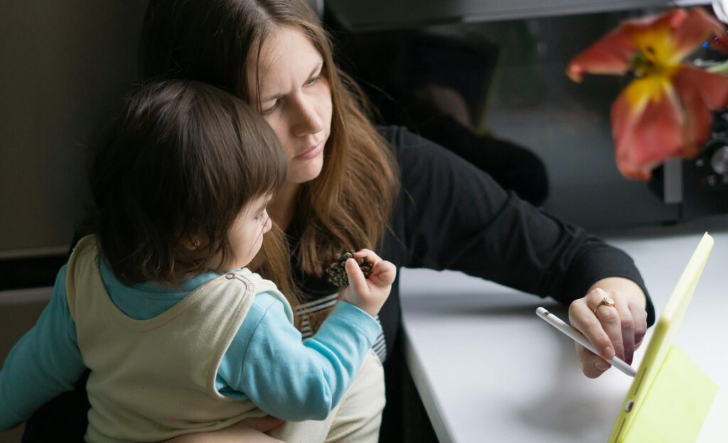 parent using school portal on laptop