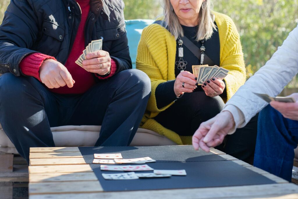 people playing card game