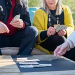people playing card game