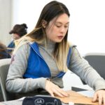 student learning about cybersecurity on laptop