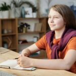 teenager learning finance online