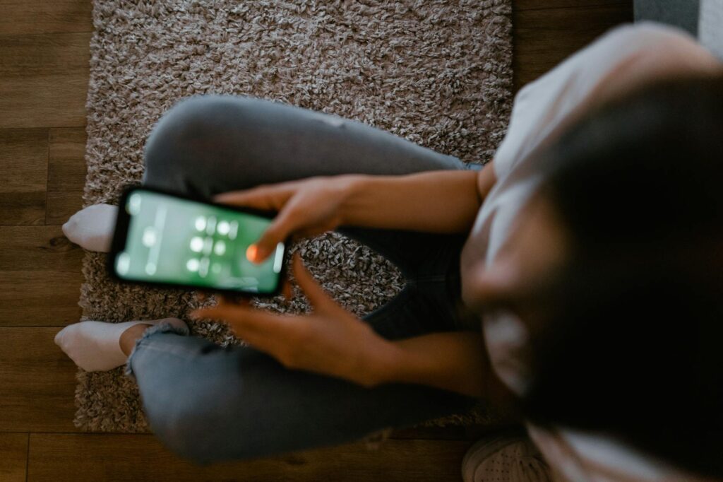 person unplugging phone